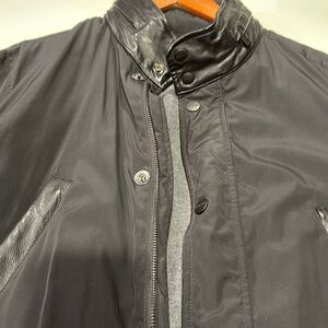 Warm lined rain coat with leather accents